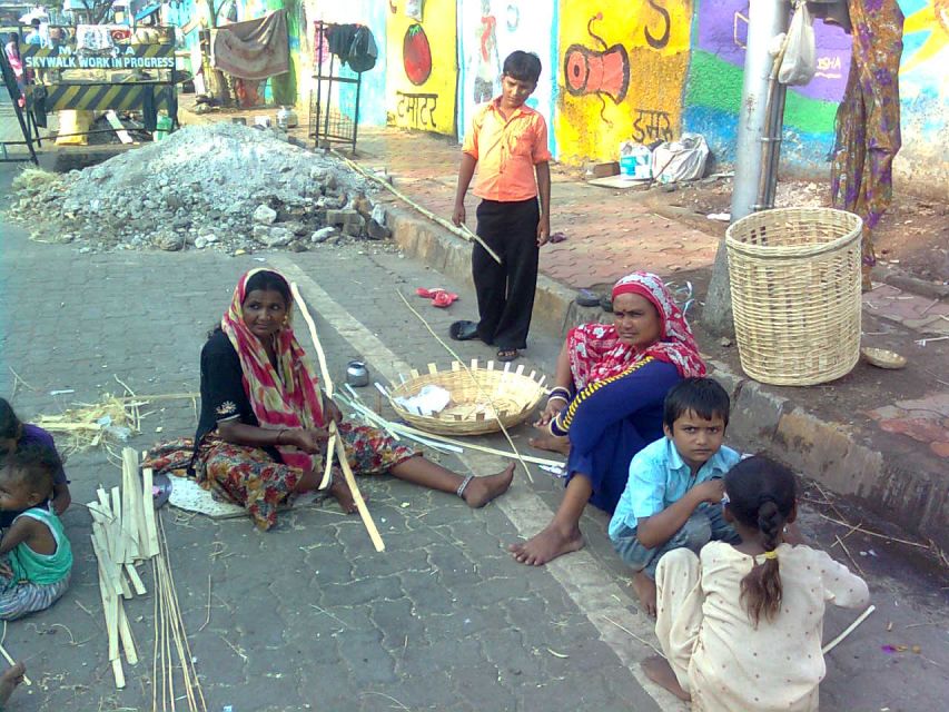 Bollywood tour with Slum Tour & Dance show - Walking through Dharavi’s working streets