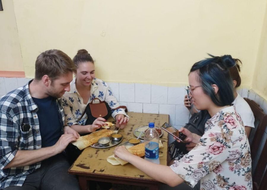Chennai: 2 Hour Street Food Walking Tour - Following the guide through Chennai’s food streets