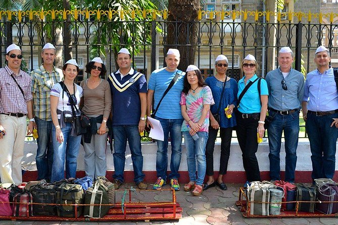 Dabbawala, Dhobi Ghat & Dharavi slum Tour with Local Train Ride - Meeting Mumbai’s dabbawalas