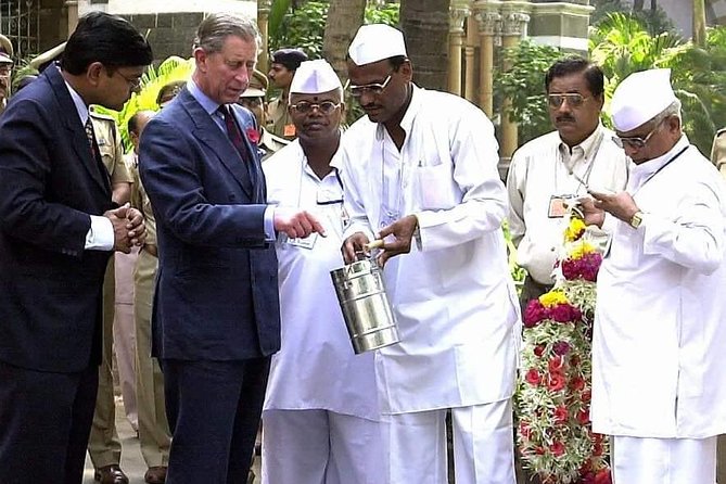 Dabbawala, Dhobi Ghat & Dharavi slum Tour with Local Train Ride - The pace, comfort, and sensitive side of the visit