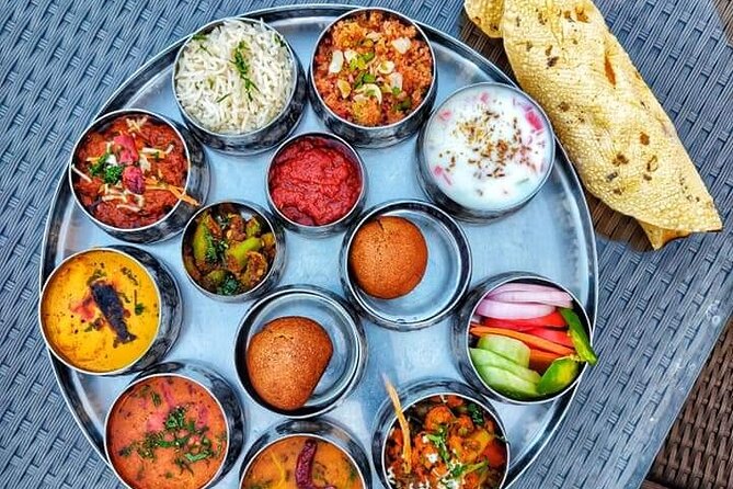 Dinner at Indian Ethnic Restaurant & Witness Majestic Night Arti - The food choices: thali, snacks, and sweets
