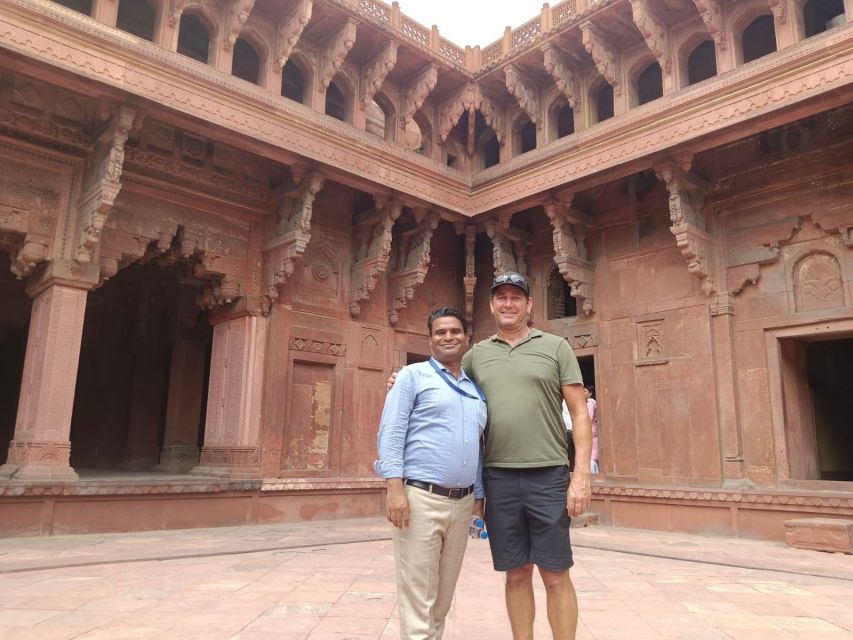 From Delhi: Private Layover Taj Mahal Day Tour By Car - Agra Fort and the Mughal story
