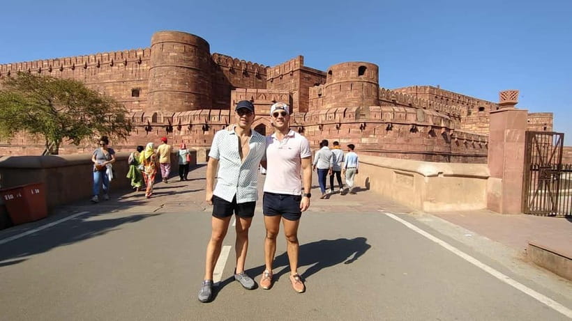 From Jaipur: Private Taj Mahal & Agra Day Trip with 5</em> Lunch – Lunch at the DoubleTree by Hilton Hotel Agra’ /></p>
<p><p>If you choose the lunch option, the itinerary includes a 45-minute meal at the DoubleTree by Hilton Hotel Agra. The lunch is described as a buffet at a multi-cuisine restaurant, giving you a comfortable pause between sightseeing stops.</p>
</p>
<p><p>I see this as a practical comfort rather than the most authentic food experience of the day. A five-star hotel offers a predictable setting, clean facilities, and a broad selection, which is useful after an early start. The meal also removes the hassle of searching for a restaurant in an unfamiliar city.</p>
</p>
<p><p>The food receives generally positive comments, and one guide, Ankur Sharma, was praised for explaining local foods and helping with choices. Another account describes lunch at the Hilton as enjoyable and well organized. Drinks are not included, so budget separately if you want tea, bottled soft drinks, or anything beyond the included meal.</p>
</p>
<p><p>The timing can vary. The published route places lunch after the Taj Mahal and before Agra Fort, while some visits have placed Agra Fort first or included breakfast after the Taj Mahal. That is not necessarily a problem, since the private format allows some adjustment, but you should confirm the day’s order with the operator.</p>
</p>
<h2 id="agra-fort-where-the-story-gets-more-complicated">Agra Fort, where the story gets more complicated</h2>
<p> Lunch – Agra Fort, where the story gets more complicated’ /></p>
<p><p>Agra Fort receives about one hour of guided touring. This red sandstone fortress is not simply a military wall. It is a large Mughal complex with courtyards, halls, palaces, and views toward the Taj Mahal.</p>
</p>
<p><p>The fort gives you a different way to understand Agra. At the Taj Mahal, the focus is love, symmetry, marble, and mourning. At Agra Fort, the story turns toward emperors, court life, power, imprisonment, and succession. A good guide helps connect the two sites instead of treating them as separate photo stops.</p>
</p>
<p><p>One hour is enough for a focused visit, but it is not enough to explore every corner. If the fort is your main interest, you may want to tell your guide that you prefer historical explanation over extra photo stops. The private group format makes that request easier than it would be on a large coach excursion.</p>
</p>
<p><p>Guides such as Arif, Anshu, Amit, and Faizan have been praised for explaining both the architecture and the human stories behind the buildings. Faizan was also noted for discussing local artisans, which can add useful context to the marble work associated with Agra.</p>
</p>
<div class="twil" style="margin: 20px 0; padding: 15px 0;"><p>More Taj Mahal Tours in Jaipur</p><ul style="margin: 10px 0; padding-left: 0; list-style: none;"><li style="margin: 0 0 12px 0; padding: 0 0 12px 0; border-bottom: 1px solid #eee; line-height: 1.4;"><a href="https://indiatravelreviews.com/skip-the-line-sunrise-taj-mahal-agra-day-tour-from-jaipur/">Skip The Line: Sunrise Taj Mahal & Agra Day Tour From Jaipur</a><br><span style="font-size: 0.82em; color: #555;"><span style="color: #B85C1E;">★</span> 5.0 &nbsp;&middot;&nbsp; 251 reviews</span></li><li style="margin: 0 0 12px 0; padding: 0 0 12px 0; border-bottom: 1px solid #eee; line-height: 1.4;"><a href="https://indiatravelreviews.com/same-day-taj-mahal-agra-fort-baby-taj-tour-from-jaipur-by-car/">Same Day Taj Mahal, Agra Fort & Baby Taj Tour from Jaipur by Car</a><br><span style="font-size: 0.82em; color: #555;"><span style="color: #B85C1E;">★</span> 5.0 &nbsp;&middot;&nbsp; 242 reviews</span></li><li style="margin: 0; padding: 0; border-bottom: none; line-height: 1.4;"><a href="https://indiatravelreviews.com/from-jaipur-taj-mahal-agra-private-guided-day-tour/">From Jaipur: Taj Mahal & Agra Private Guided Day Tour</a><br><span style="font-size: 0.82em; color: #555;"><span style="color: #B85C1E;">★</span> 4.9 &nbsp;&middot;&nbsp; 68 reviews</span></li></ul></div><h2 id="the-baby-taj-in-a-quieter-half-hour">The Baby Taj in a quieter half-hour</h2>
<p><img width="689" height="650" decoding="async" src=