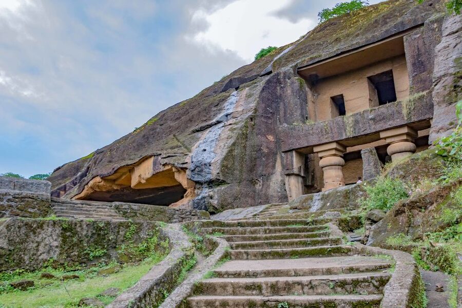 From Mumbai: Kanheri Cave Half-Day Tour - The main hall, Buddha image, and carved pillars