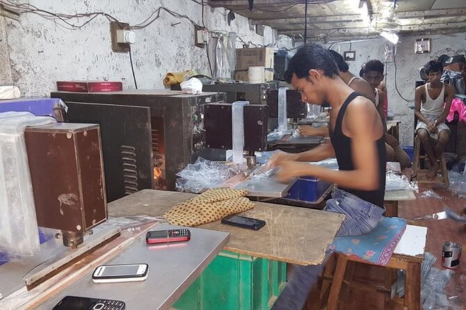 Group Tour of Dharavi Slum walk with local Guide - Starting near Mahim at Third Wave Coffee