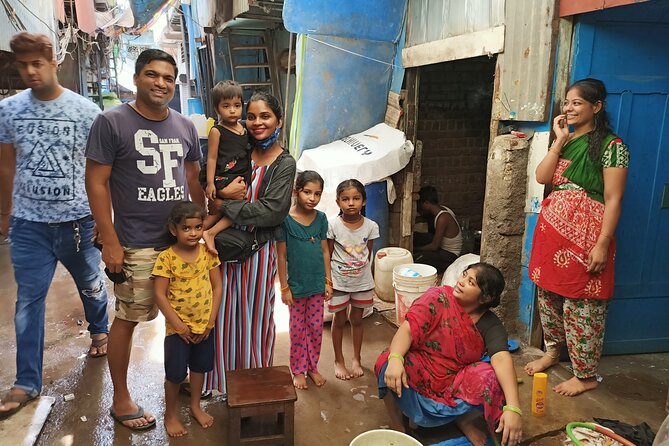 Group Tour of Dharavi Slum walk with local Guide - Narrow alleys, homes, schools, and hospitals