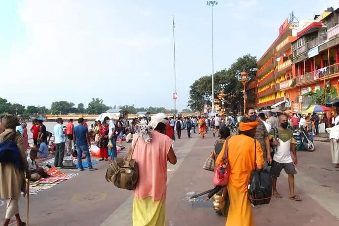 Guided Haridwar Walk with Ghats & Evening Ganga Aarti - Walking through Bara Bazar and the market Shiva temple