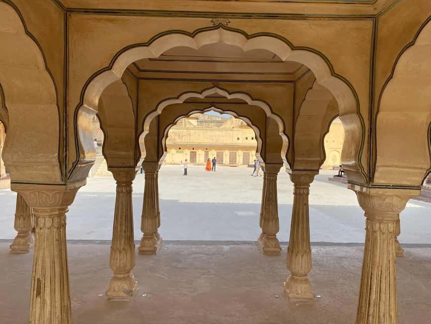 Jaipur: Amber Fort Guided Tour and Entry Ticket - Fortifications, water channels, and views over Maota Lake