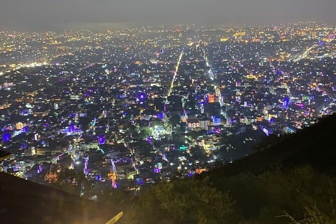 Jaipur Nahargarh Fort Sunset and Night City Tour - Royal Gaitor offers a quiet pause beneath the fort