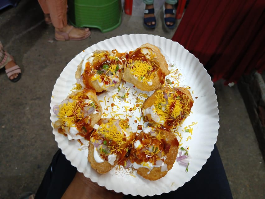 Kolkata Midtown Madness- A Street Food & Nightlife Tour - Bowbazar: temple bells and old Bengali sweets