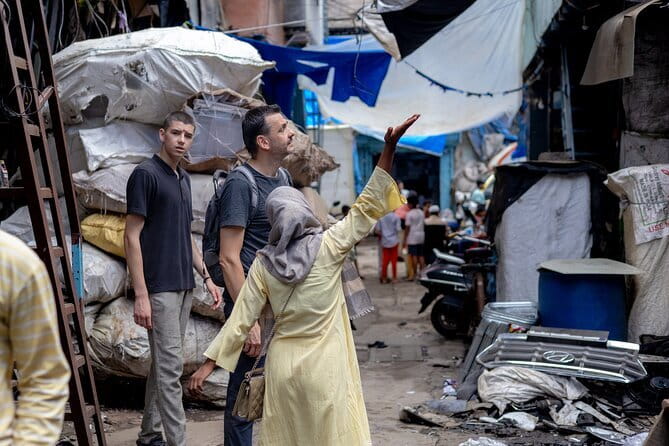 Mumbai Dharavi Slum, Dhobi Ghat & Dabbawala Lunchbox Tour - Dharavi, approached as a living neighborhood