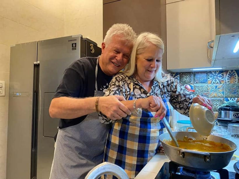 New Delhi: Indian Cooking Class in a Local Home - Sitting down to eat with JD and his family