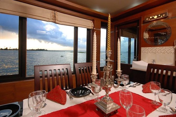 Private Full-Day Kerala Backwaters Houseboat Tour With Lunch & Pickup From Kochi - Boarding A Traditional Kettuvallam