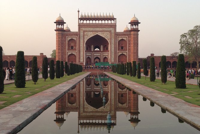 Private Taj Mahal Sunrise and Agra Fort Skip the Line Tour - Sitting across the river at Mehtab Bagh