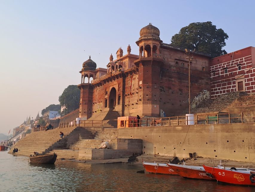 Varanasi: Sunrise Boat Tour with Arti Ceremony - Boarding the boat and meeting the riverfront