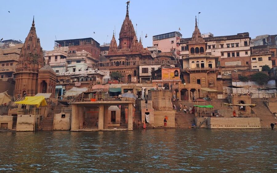 Varanasi: Sunrise Boat Tour with Arti Ceremony - Passing roughly 55 ghats from the water